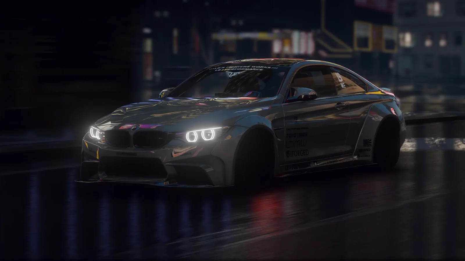 Dark gray BMW M4 LB Works driving through wet city streets at night