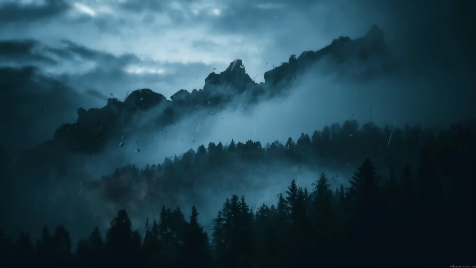 Pale mist layered between dark evergreen forests and blue mountains