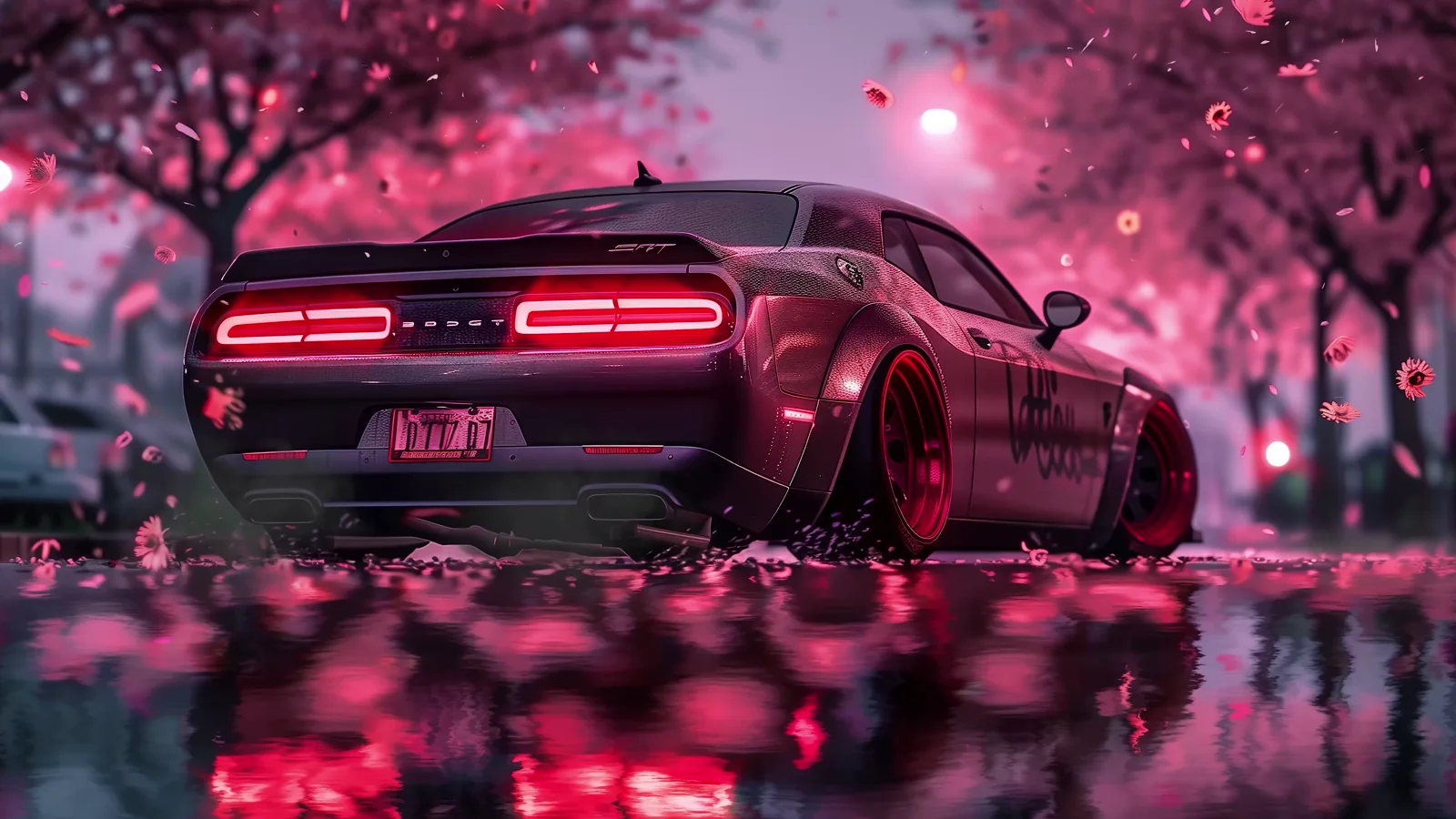 Red Dodge Challenger beneath pink blossoms and falling petals